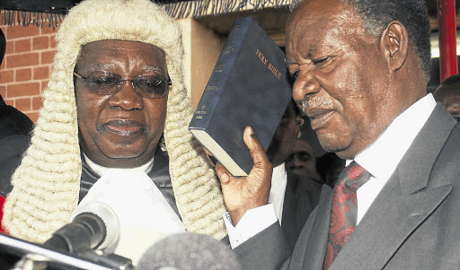 Zambian opposition leader Michael Sata is sworn in as president in Lusaka on Friday. Sata, a critic of Chinese investment, was sworn in after an upset election victory that ushered in a smooth handover of power in Africa's biggest copper producer Picture: REUTERS