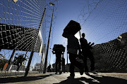 Foreigners enter South Africa at the Beitbridge border post.