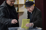 People arrive to cast their votes at a polling station during Turkey's General Election on May 14, 2023 in Ankara, Turkey.