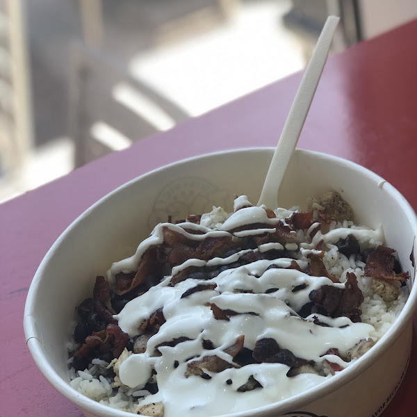 Taco bowl with chicken, bacon, rice, beans and sour cream. Yum!!