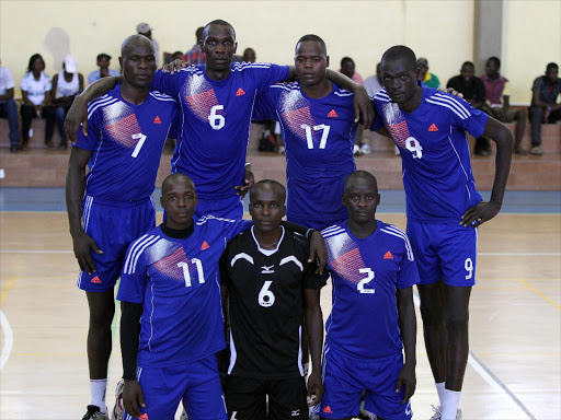 Kenya Prisons Team playing against Coop Bank during their Kenya Volleyball Federation National league play-offs at KPA Makande hall in Mombasa on November 28, 2014. /FILE