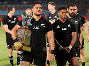 New Zealand's Ofa Tu'ungafasi with the Freedom Cup trophy after the Rugby Championship match against South Africa at Loftus Versfeld in Pretoria on October 6, 2018.