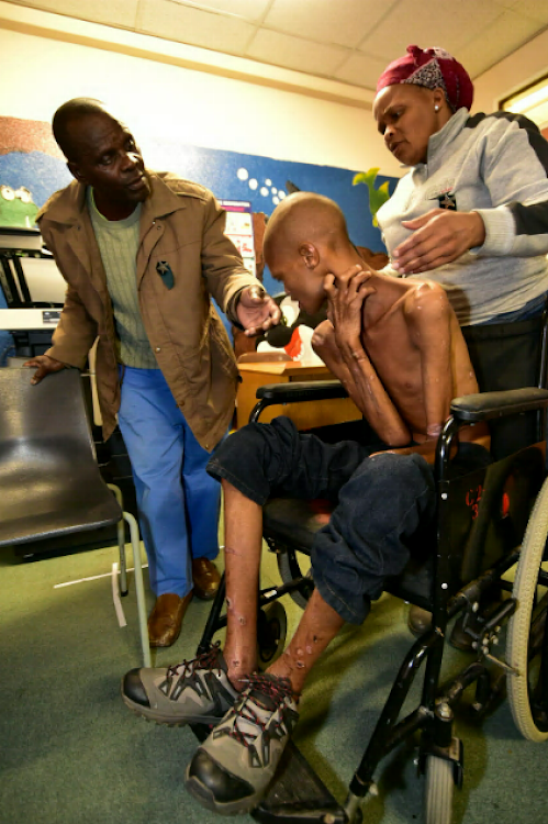 Notshe Ntshinka and Phumla Gotyana with their son, Sikhumbuzo, at Dora Nginza Hospital after his return from Mthatha