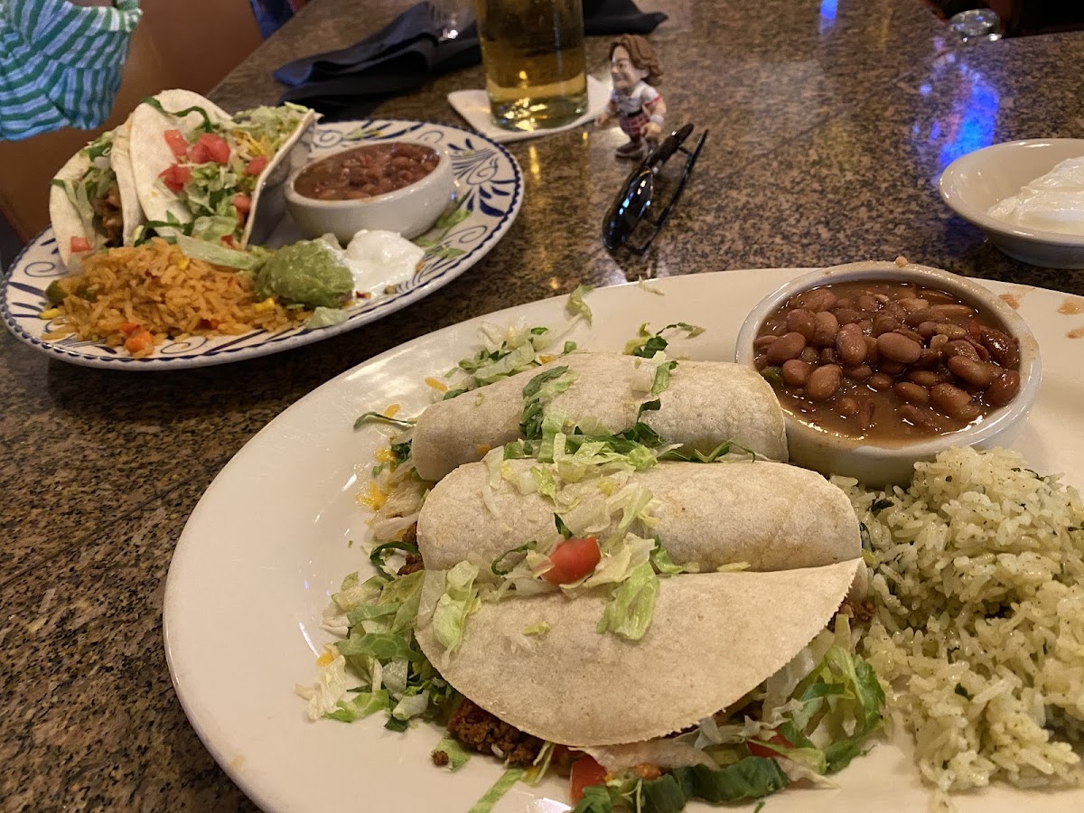 Gluten free beef tacos. Side of beans and rice.