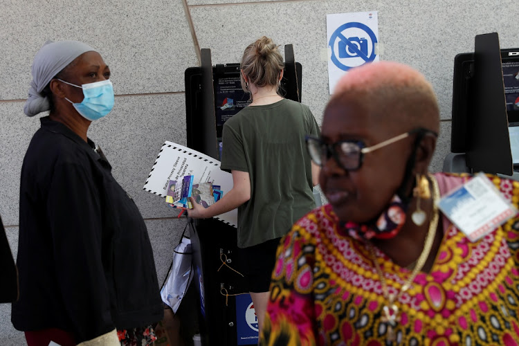 A voter electronically submits her ballot during early voting for the New York primary election at the Brooklyn Museum voting station in New York City, U.S., June 16, 2021.