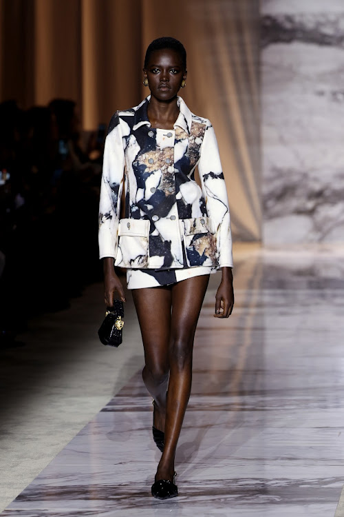 A model walks the runway at the Roberto Cavalli fashion show during the Milan Fashion Week.