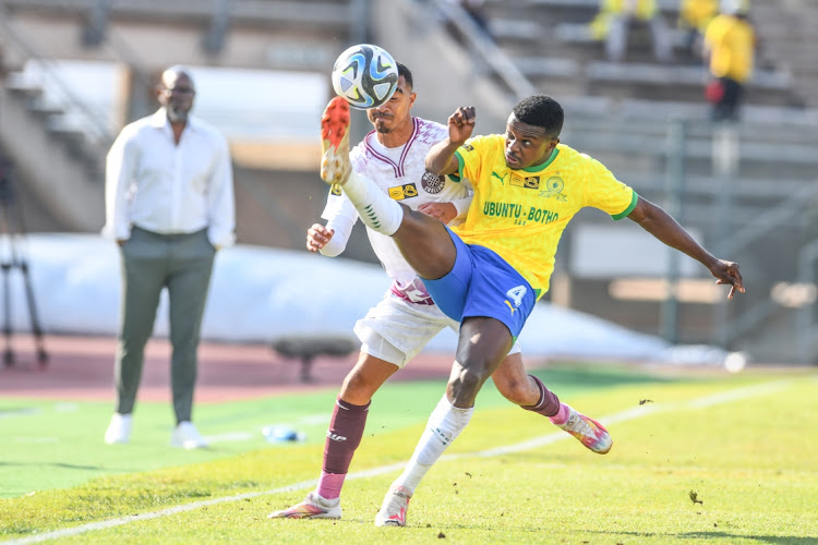 Mamelodi Sundowns' Teboho Mokoena competes for the ball with Keenan Pillips of Moroka Swallows in their MTN8 quarterfinal at Lucas Moripe Stadium on August 12 2023.