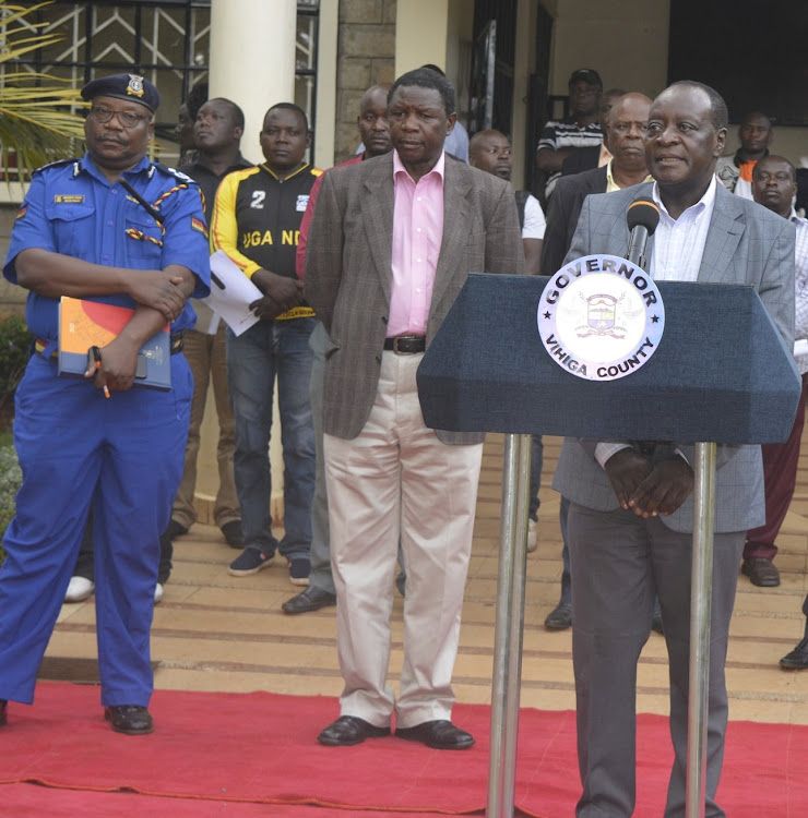 Vihiga police commander Hassan Barua, county commissioner Ochillo Oyugi and Governor Wilber Ottichillo