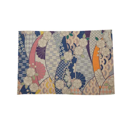 Cérémonie du thé avec set de table artisanal et manique en tissu, pour une dégustation de thé raffinée et un service élégant.