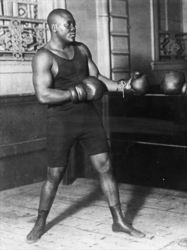 American heavyweight boxer Jack Johnson in action sparring