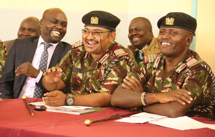 Elgeyo Marakwet Deputy Governor Wisley Kiptoo, county commissioner Hassan Omar and regional commissioner George Natembea during a security meeting in Iten town on Wednesday.