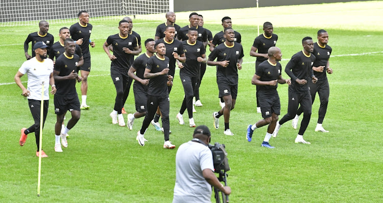 Bafana Bafana players warm up in their training session at Orlando Stadium on Monday.