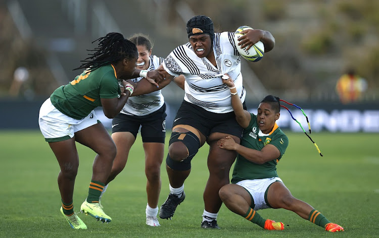 Siteri Rasolea of Fiji smashes through the South African defence during the Pool C Rugby World Cup 2021 match at Waitakere Stadium in Auckland, New Zealand on October 16 2022.