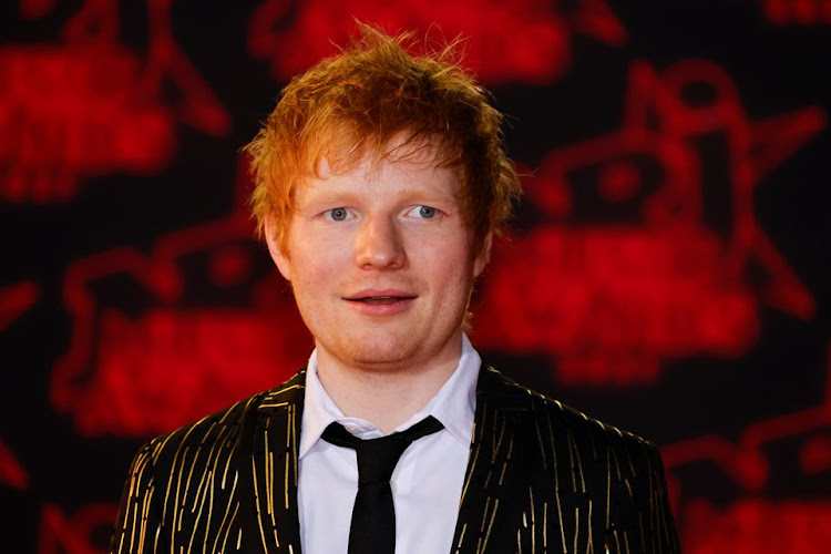 Singer Ed Sheeran poses as he arrives to attend the NRJ Music Awards ceremony at the Festival Palace in Cannes, France November 20, 2021.