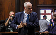 Rob Packham appears in the Western Cape High Court on March 18 2019 for the murder of his wife Gill Packham. 