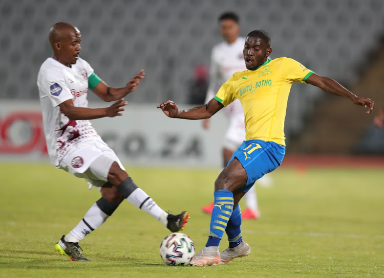 Aubrey Modiba of Mamelodi Sundowns challenged by Lebohang Mokoena of Swallows during the DStv Premiership match between Swallows FC and Mamelodi Sundowns at Dobsonville Stadium on May 29, 2021 in Johannesburg, South Africa.