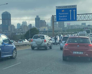 Armed suspects took advantage of a traffic jam during peak hours on the busy M1-M2 split at the Crown Interchange to rob motorists.