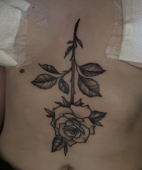 Stomach Upside Down Rose Tattoo