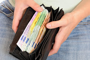 Instead of carrying a wad of cash, in a wallet. File photo