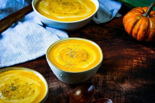 Bowls of Creamy Pumpkin Soup.