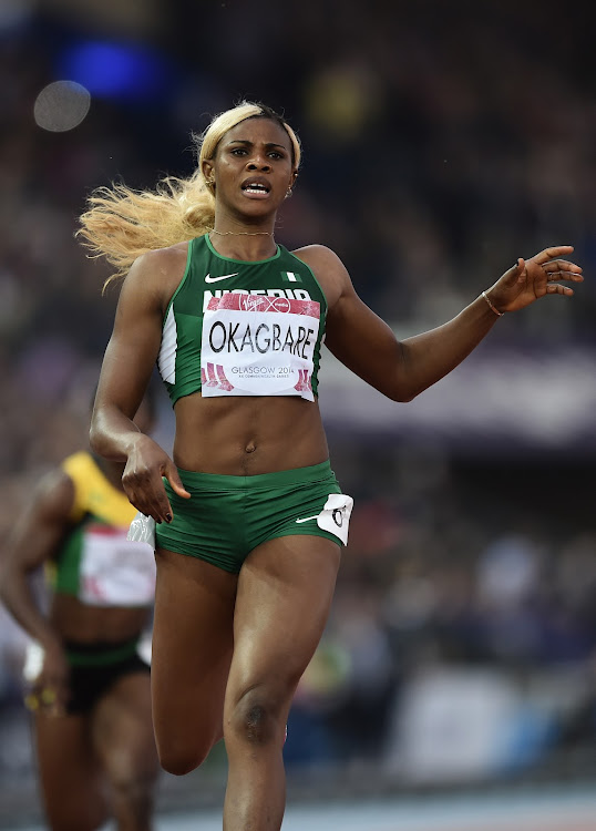 Nigeria’s Blessing Okagbare wins the final of the women’s 200m athletics event during the 2014 Commonwealth Games in Glasgow,