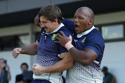 Kwagga Smith and Bongi Mbonambi enter the field for the Springboks' captain's run at Arcs Urayasu Park in Urayasu, Chiba, in Japan on Friday, before Saturday's Rugby World Cup final against England.