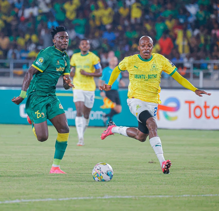 Kennedy Musonda of Young Africans and Khuliso Mudau of Mamelodi Sundowns in action during their CAF Champions League quarterfinal at the Benjamin Mkapa National Stadium.