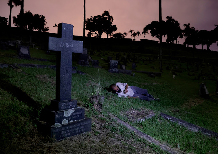 Vaughan Durno, 39, sleeping among the dead at Stellawood Cemetery in Umbilo.