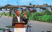 Former US president Barack Obama addresses delegates during the launch of Sauti Kuu resource centre near his ancestral home in Nyangoma Kogelo village in Siaya county, Kenya July 16, 2018. 