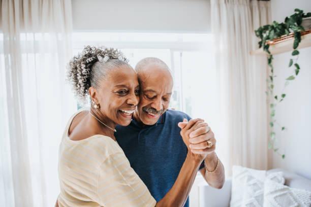 senior couple dancing together senior couple dancing together empty nester stock pictures, royalty-free photos & images