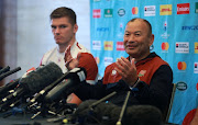 Eddie Jones (R) the England head coach faces the media with his captain Owen Farrell during the England media session on October 22, 2019 in Tokyo, Japan.