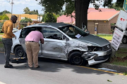 Police inspect a vehicle after a car chase and subsequent shootout in Roosevelt Park, Johannesburg. Two suspects have been arrested in connection with a robbery in the area on Monday January 10. 