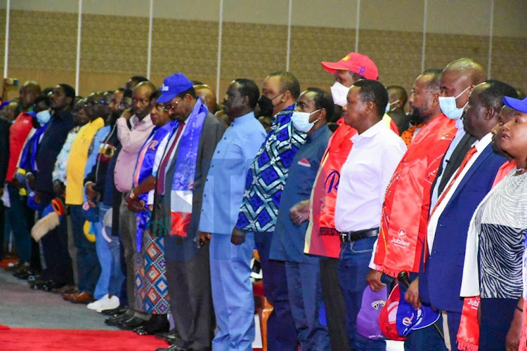 ODM Party leader Raila Odinga accompanied by President Uhuru Kenyatta, Wiper Party leader Kalonzo Musyoka, Machakos Governor Alfred Mutua, Kitui County Governor Charity Ngilu among other leaders during the Azimio NDC on March 12, 2022.