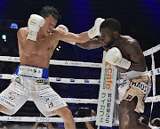 Lerato Dlamini exchanges blows with Tomoki Kameda in Japan on Saturday. 