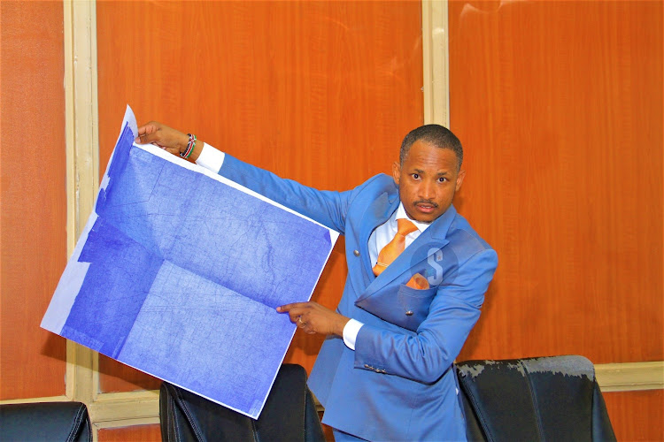 Embakasi east Mp Babu Owino with a map showing the Late Gershon Kirima's land in Njiru during a briefing in parliament on October.26th.2023/EZEKIEL AMING'A