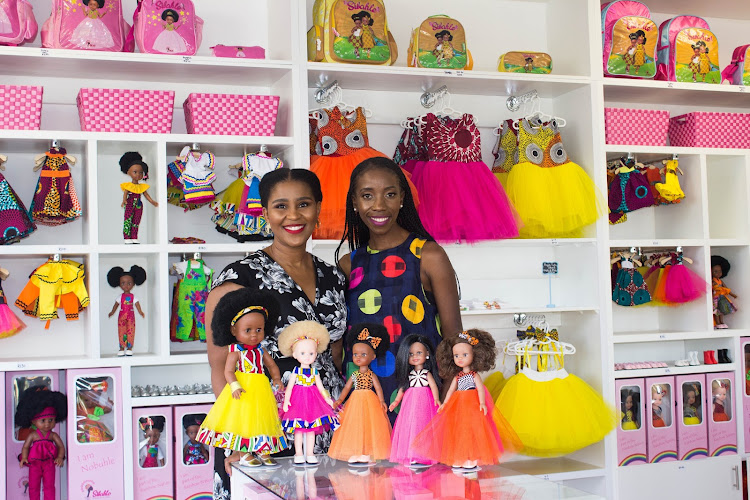 Khulile Vilakazi-Ofosu, left, and Caroline Hlahla with some of the diverse dolls in their Sibahle Collection.