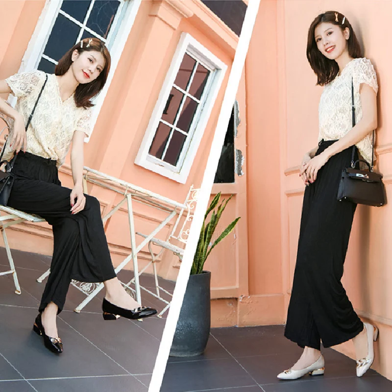 Décolleté da donna con tacco quadrato e punta affusolata in vernice. Eleganza e comfort per ogni occasione, per un look impeccabile.