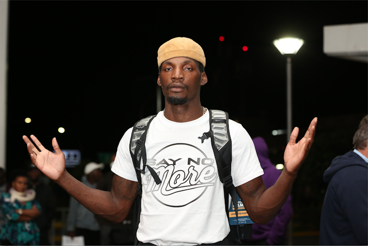 Olympic 100m silver medalist Fred Kerley poses upon arrival at the Jomo Kenyatta International Airport on Wednesday morning