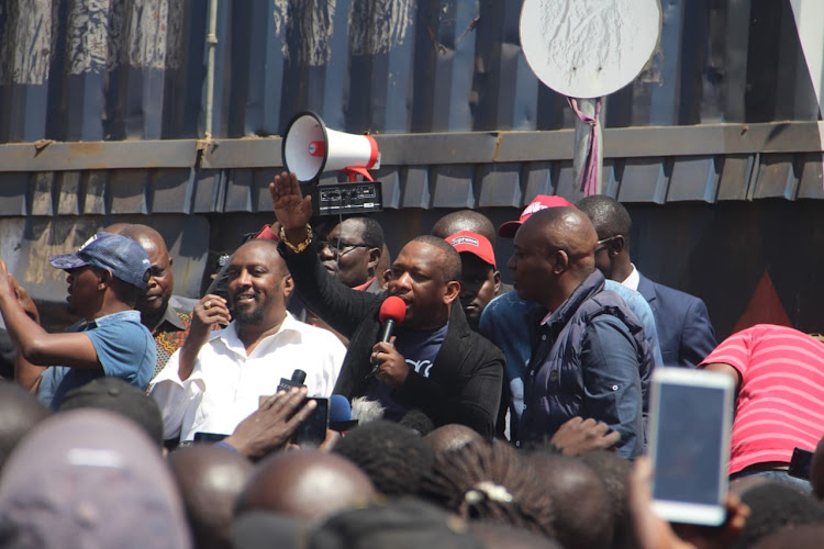 Nairobi Governor Mike Sonko addresses Kibra residents after the Toi Market fire on Tuesday.