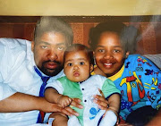 Shona Ferguson seen here with his daughters.