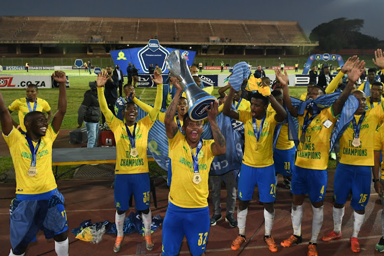 Sundowns celebrate with the trophy after winning yet another DStv Premiership title in May 2022.