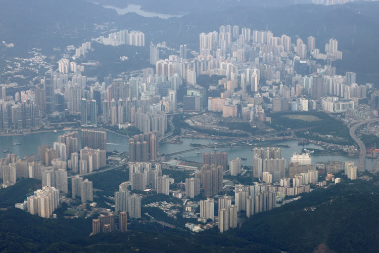 Aerial view of residential housing seen through the window of an airplane in Hong Kong, China October 24, 2020.