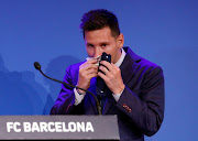 Lionel Messi gets emotional as he bids farewell to Barcelona during a press conference at Camp Nou on August 8, 2021.