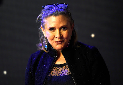 Carrie Fisher poses for cameras as she arrives at the European Premiere of Star Wars, The Force Awakens in Leicester Square, London, December. REUTERS/Paul Hackett