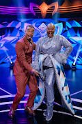 Host of The Masked Singer SA, Mpho Popps, with seasoned actor Zikhona Sodlaka.