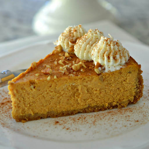 This delectable pumpkin cheesecake is a cream cheese based delight blended with festive fall spices and baked in an easy to make graham cracker crust.  It is perfect for all of your holidays, parties and special occasions.