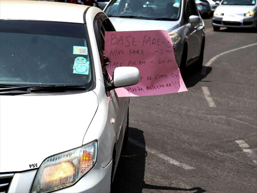 A taxi driver protests in Nairobi following a strike called by Uber drivers, September 11, 2017. /ENOS TECHE.