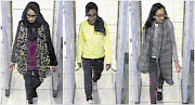 DISAPPEARING ACT: British teenage girls Shamima Begun, Amira Abase and Kadiza Sultana walk through security at Gatwick Airport before they boarded a flight to Turkey. It is believed they aim to start a new life with Islamic State in Syria