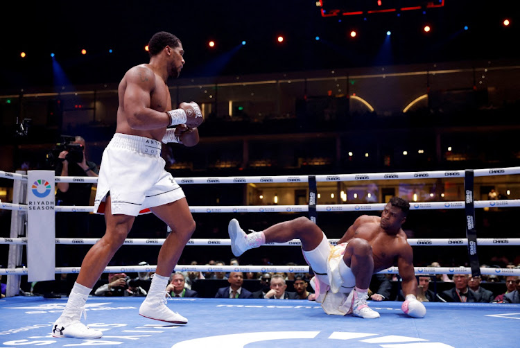 Anthony Joshua knocks down Francis Ngannou.