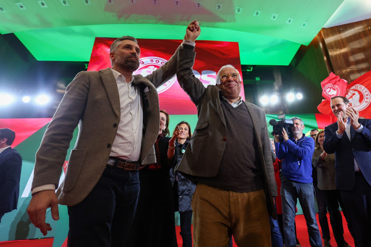 Socialist Party secretary-general Pedro Nuno Santos and Portugal Prime Minister Antonio Costa raise their hands during a campaign rally ahead of snap elections in Lisbon, Portugal, on March 5 2024. Picture: PEDRO NUNES/REUTERS